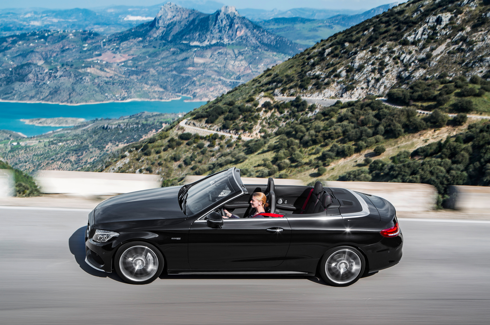http://st.automobilemag.com/uploads/sites/11/2016/02/2017-Mercedes-AMG-C43-Cabriolet-side-in-motion-1.jpg