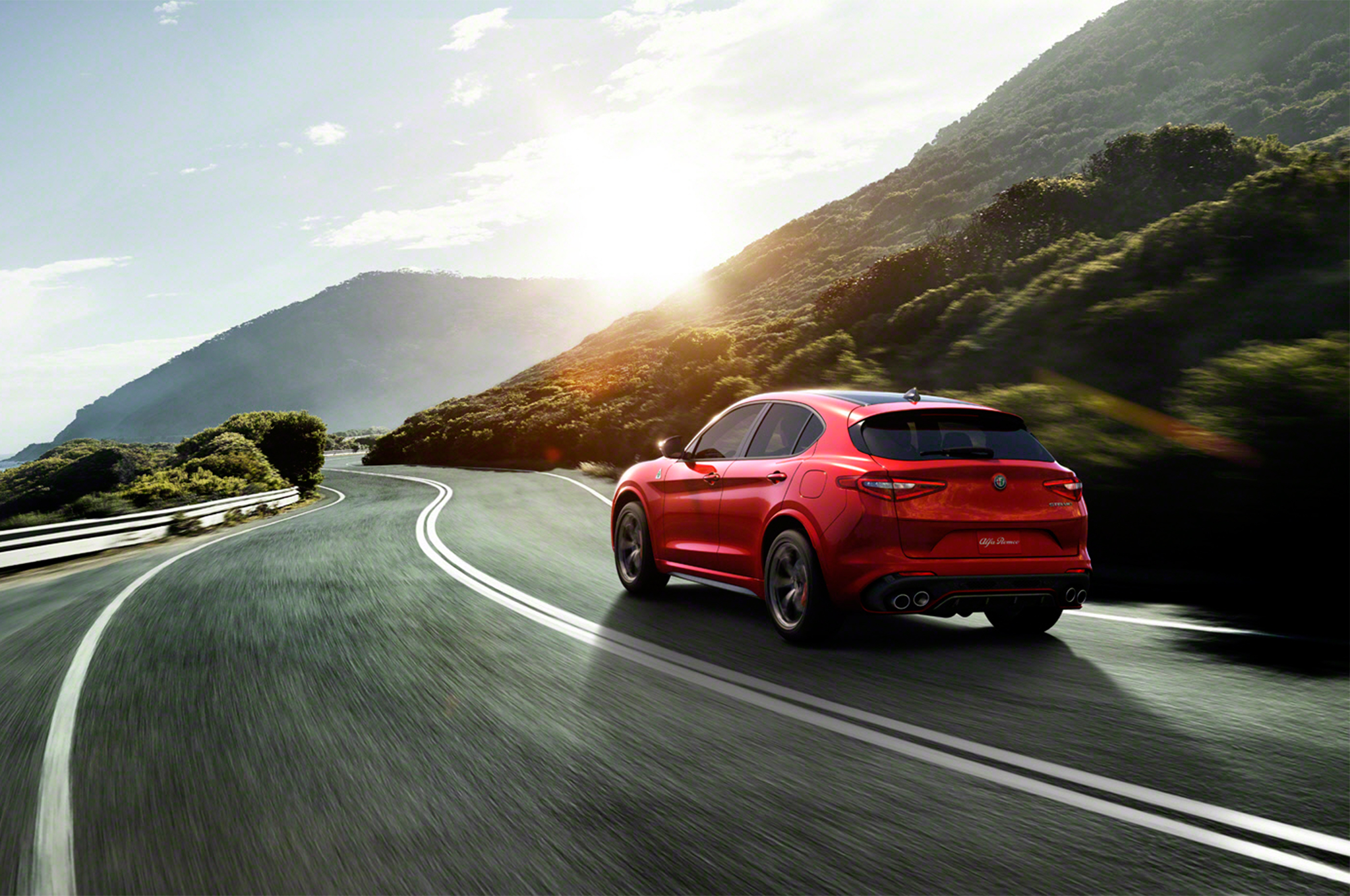 2018 Alfa Romeo Stelvio rear three quarter in motion