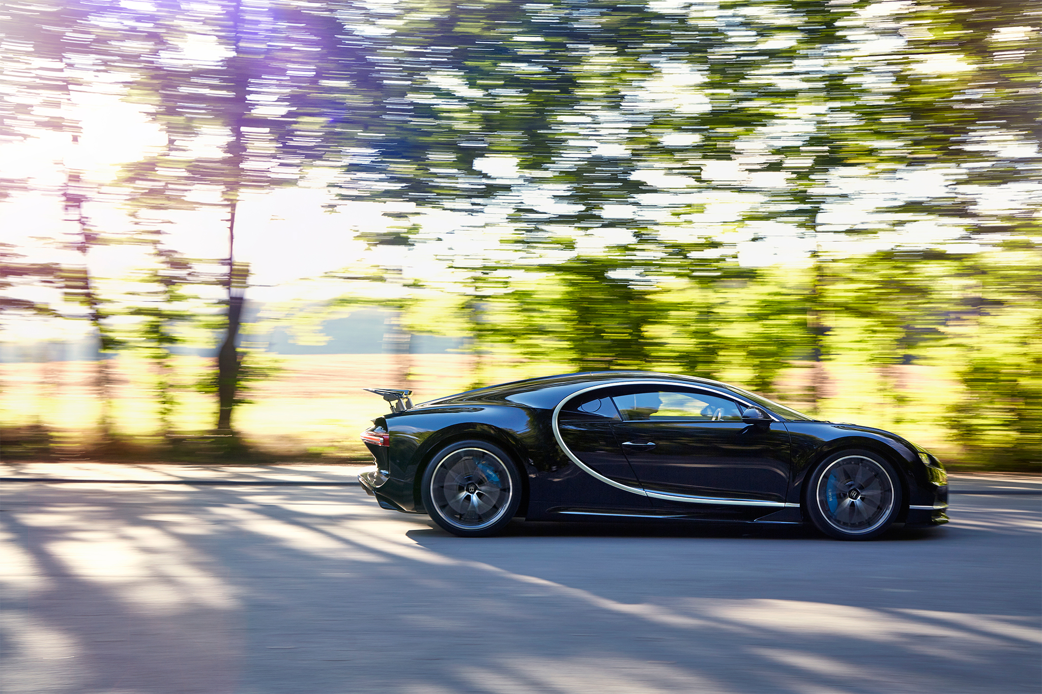2017 Bugatti Chiron side profile in motion 2017 Bugatti Chiron side profile in motion